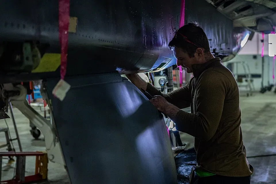 Man repairing an aircraft